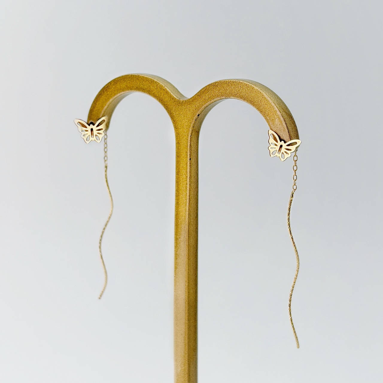 گوشواره بخیه پروانه